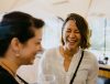 two women laughing together